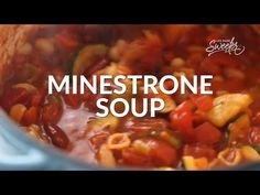 a pot filled with lots of food sitting on top of a stove next to the words minestone soup