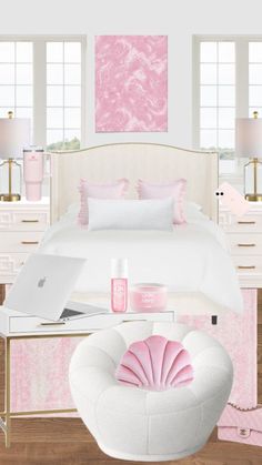 a bedroom with pink and white decor on the walls, bed, desk, chair, laptop computer and other items