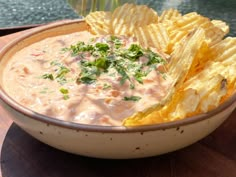 a bowl filled with chips and dip