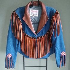 Size :Large Brand: Diamond Denim & Leather Women's Western Jacket With Denim And Leather With Leather Collar And Black And Tan Leather Fringe And Beaded On Sleeves And On Back. In Perfect Condition. Western Jacket, Women Diamond, Leather Collar, Leather Fringe, Leather Jackets, Black And Tan, Tan Leather, Blue Brown, Leather Women