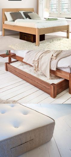 there is a bed that has been made with wood and mattresses on the floor