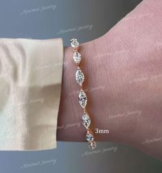 Marquise Moissanite tennis bracelet,solid 14k gold bracelet,eternity Moissanite bracelet,lab diamond tennis bracelet,wedding bracelet,women aniversary gift DESCRIPTION  -------------------- *Moissanite Details  →Stone                            :marquise  →Size (mm)                      :6*3 →Stone Total CTW          :4 to7 →Color                              :Colorless →Clarity                            :VVS  *Lab Diamond Details  →Stone                            :marquise  →Size (mm) Rose Gold Tennis Bracelet With Prong Setting For Wedding, Rose Gold Tennis Bracelet For Wedding With Prong Setting, Moissanite Bracelets With Prong Setting For Wedding, Wedding Tennis Bracelet With Hand Set Moissanite, Wedding Moissanite Tennis Bracelet In Fine Jewelry Style, Wedding Moissanite Tennis Bracelet Fine Jewelry, Wedding Fine Jewelry Moissanite Tennis Bracelet, Dainty Diamond Bracelet With Prong Setting For Wedding, Dainty Round Cut Diamond Bracelet For Wedding