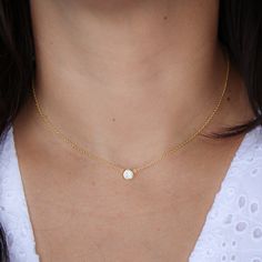 Ultra Dainty Necklace with Solitary Circle CZ (Cubic Zirconia). A genuine simple circle necklace of Cubic Zirconia gemstone is suspended in our signature delicate sparkly chain for the ultimate in minimal understated elegance.  The "SOLITARY CIRCLE CUBIC ZIRCONIA" Choker * SN30292 D E T A I L S: * Genuine Cubic Zirconia gemstone * Highest quality of Sterling Silver 925, 18K Gold Plated and 18K Rose Gold Plated Chain  * The stone is 4mm M A T E R I A L S: * 100% Sterling Silver 925, 18K Gold Plat Dainty Round Birthstone Diamond Necklace, Solitaire Necklace With Delicate Chain For Everyday, Everyday Solitaire Necklace With Delicate Chain, Minimalist Solitaire Birthstone Necklace, Dainty Round Solitaire Necklace For Everyday, Delicate Round Diamond Birthstone Necklace, Minimalist Diamond-white Solitaire Necklace With Birthstone, Minimalist Round Solitaire Necklace With Delicate Chain, Dainty Anniversary Solitaire Necklace With Round Pendant