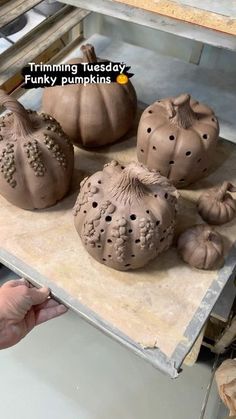 clay pumpkins and gourds are being made