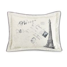 a pillow with the eiffel tower on it