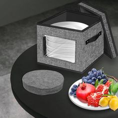 a plate with fruit on it sitting next to a microwave and dishwasher cover