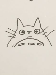 a drawing of a cat with big eyes and a frown on it's face