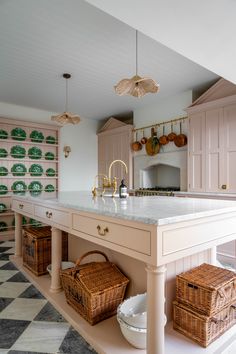 a large kitchen island with baskets on it