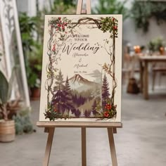 an easel with a wedding sign on it