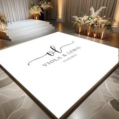 a white dance floor with flowers and candles on the side that says volla & lynn