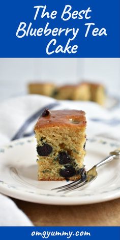 the best blueberry tea cake on a plate with a fork