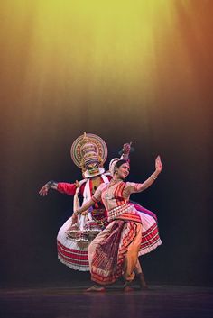 Kathakali, an Indian Classical dance which originated in Kerala. Kathakali is greatly distinguished from the other dance forms as a kind of 'story-play'. This particular dance form is famous for its elaborate costume style, unique make-up procedure and detailed emphasis on dramatic emotions. The costumes and make-up contribute to three-quarters of the characterisation of the human role that the dancer portrays. The different colors applied to the face identifies their role as a negative lead, vi Dance Poster Design, Dancing Poses, Kathak Dance, Jagjit Singh, Dance Painting