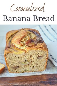 a loaf of caramelized banana bread on top of a wooden cutting board