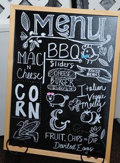 a blackboard with different types of food written on it and some writing on the board