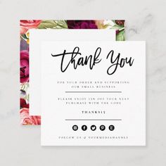 a floral thank card with the words, thank you on it and an envelope in black ink