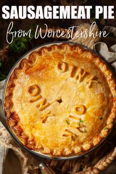 a close up of a pie with the words'sausagemeat pie'written on it