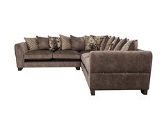 a sectional couch with pillows on it