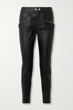 A pair of black leather pants will always be on trend - Isabel Marant's 'Hizilis' version nods to classic biker styles. They're designed to sit high on the waist and have slim, paneled legs with silver-tone zipped pockets. Edgy Leather Bottoms With Zip Fly, Black Leather Pants With Zip Fly, Edgy Black Leather Pants, Moto Leather Bottoms For Fall, Black Leather Moto Bottoms, Black Biker Workwear Pants, Edgy Leather Pants For Biker Events In Fall, Black Leather Moto Pants, Edgy Leather Pants For Work