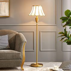 a living room scene with focus on the floor lamp