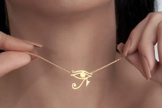 Eye Of Ra Necklace, Eye Of Horus Pendant, Egyptian Jewelry, Mythology Necklace, Spiritual Necklace, Eye Of Ra Charm, Evil Eye Necklace TO OUR VALUED CUSTOMERS ! Please take a look at our special catalog that we have prepared for you ! ▶ https://www.etsy.com/shop/MarryMinimalist ✔️ All products in our unique store are personalized. ( You can find our font list in the images ) D E T A I L S ✔️A lifetime silver CLEANING CLOTH is given as a GIFT along with the 925 Sterling Silver Necklace! ✔️ * Made to Order. * Handmade with Sterling %100 925K Sterling Solid Silver. * Choice of Gold Color: Gold, Rose Gold, Silver * Length: 14", 16", 18", 20", 22" * Ready to Ship in 1-3 Business Days * Free returns within 14 days from the order date. ✔️ 24/7 Friendly Customer Service, contact us for any questio Eye Of Horus Necklace, Egyptian Eye, Spiritual Necklace, Eye Of Ra, Egyptian Jewelry, Eye Of Horus, Evil Eye Necklace, Eye Necklace, Sterling Silver Necklace