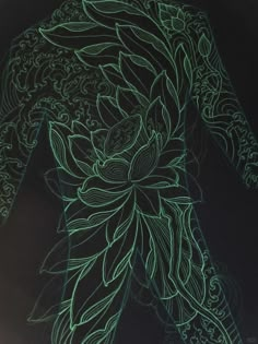 a drawing of a woman's torso with flowers on the side and leaves on the back