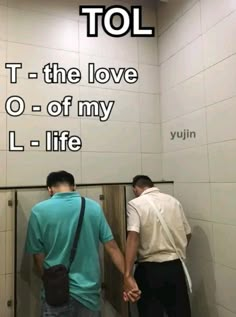 two men standing in front of an elevator with the caption tol t = the love o = of my l - life