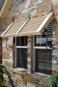 an awning on the side of a brick building