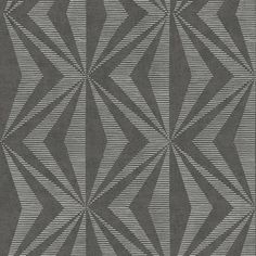 a black and white rug with an abstract design