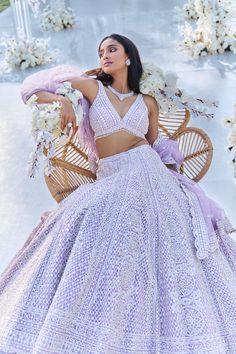 This lehenga set features pearl, sequin & crystal embroidery on a lavender net base. The skirt is paired with fully embellished blouse with dual strings at the back and a matching scalloped net dupatta.From Seema Gujral's Tuscan Summer collection. DELIVERY TIMEPlease allow 8-12 weeks for your outfit to arrive. FABRIC DETAILSNet Professional cleaning only. Lavender Lehenga, Tuscan Summer, Organza Lehenga, Crystal Embroidery, Vacuum Storage, Bridal Dress Fashion, Fashion Forecasting