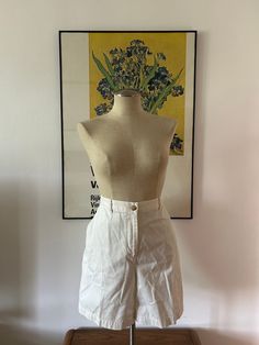 Simple and stylish shorts for your summer. These Ralph Lauren high waisted shorts are a go to in anyone's wardrobe. Classic, minimalist. Pair with a cute oversized button up or a sweet cardigan. 100% cotton. Size 14. NO RETURNS. Retro White Shorts With Pockets, Retro Wide Leg Cotton Shorts, Retro White Short Bottoms, Spring High-waisted Cargo Shorts With Built-in Shorts, Summer Cotton Wide Leg Shorts, Vintage High Waist White Shorts, White Retro Shorts For Spring, Summer Wide Leg Cotton Shorts, Retro White Shorts For Spring