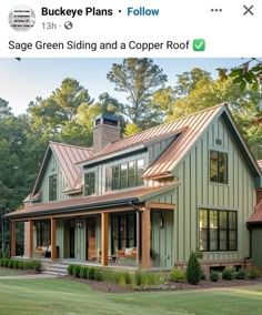 a house with green siding and a copper roof on the front porch is featured in an instagram