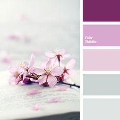 a book with pink flowers on it and some color swatches in the bottom right corner