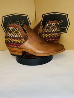 Booties handmade 100% leather design of huipil indigenous of Guatemala Color: Copper Size: 9 If you want to see more products and more styles you can visit our website www.mdltypicalfashion.com leather sole and rubber heel heel height 2″  Thick heel Almond tip Side v cut Clasp poke Bohemian Brown Closed Toe Boots, Brown Bohemian Closed Toe Boots, Bohemian Brown Ankle-high Boots, Bohemian Leather Slip-on Boots, Traditional Leather Slip-on Boots, Bohemian Ankle Boots For Festivals, Traditional Leather Boots For Fall, Brown Slip-on Festival Boots, Traditional Handmade Brown Boots