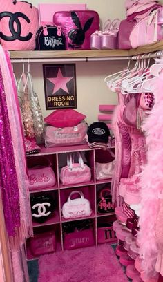 a closet filled with lots of pink items