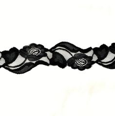 a black and white lace with flowers on it