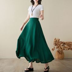 "This green skirt designed with right hidden zipper, elastic band on back for sure and comfortable fit. This skirt can be a basic piece in your wardrobe. Due to its classic cut and rich solid color it can be easily matches with many different styles. You'll feel ultra chic and modern wearing the A Line skirt throughout the year. DETAIL * 100% Linen * Two side deep pockets * Right Hidden Zipper closure * Back elastic waistband * A-line skirt * Maxi linen skirt, Plus size Skirt * Ankle length effect * Perfect for Summer and spring and autumn * Machine Washable in Warm/Cold Water/Do not bleach /Mid-iron /Hang Dry *The model is 170 cm (5′7″) tall with a 80 cm (31.5\") bust, 66 cm (26\") waist. She is wearing the green skirt in size XS. CUSTOM MADE SERVICE If you * Change other color * Can't fi Casual Green A-line Bottoms, Spring Green Skirt With Pockets, Green Maxi Skirt With Pockets For Spring, Casual Green Skirt, Casual Green Skirt With Elastic Waistband, Green A-line Bottoms For Spring, Green Full Skirt For Summer, Green A-line Spring Bottoms, Green Lined Skirted Bottoms