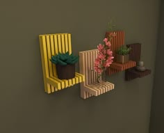 three wooden shelves with flowers and plants on them