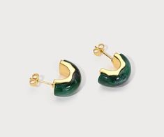 The jade stones, with their serene green hue, bring a sense of tranquility, while the golden hoops add a touch of luxury. Whether you're dressing up for a special occasion or adding a hint of refined glamour to your everyday look, the Golden Jade Whispers Hoop Earrings are the perfect choice for those who appreciate understated sophistication. Product size: 20 × 25cm Sterling silver posts 18K gold-plated brass Luxury Silver Jade Earrings, Elegant Small Hoop Green Earrings, Elegant Green Hoop Earrings, Elegant Jade Hoop Earrings, Elegant Green Hoop Earrings As Gift, Elegant Green Hoop Earrings For May Birthstone, Green Jade Hoop Jewelry, Green Emerald Small Hoop Earrings, Green Hoop Earrings For May Birthstone