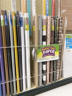 there are many different types of pens on display in the store and one is for sale