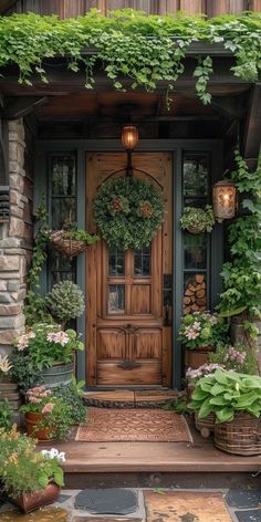 a wooden door surrounded by greenery and potted plants