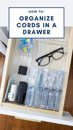 an organized drawer with glasses and other items