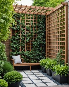 a wooden bench sitting under a trellis next to some trees and plants on the ground