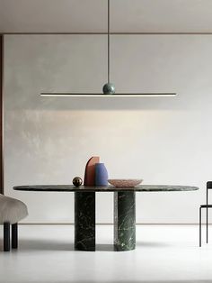 a marble table and chairs in a room