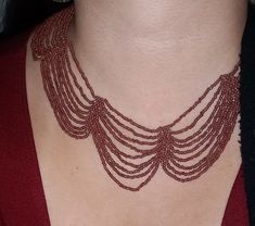 This a well made piece and perfect for Fall. It can be worn casual or dressed up, and makes a great gift. The beads are a gorgeous creamy brown color that goes with almost any neutral colored outfit. The beads tier in a collar style that just lay beautifully on your decote. The bead handiwork is intricate, and there is a three-prong clasp on the back to adjust the length of the necklace according to your size. There is some slight wear to the necklace, so some of the string of beads are lose, bu Thanksgiving Jewelry, Brown Beaded Necklace, Necklace Leaf, Beaded Collar Necklace, Autumn Necklace, Tiered Necklace, Painted Jewelry, Fall Leaf, Beaded Collar