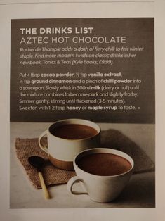 an advertisement for hot chocolate with two cups