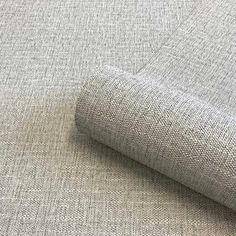 a close up shot of the fabric on a tablecloth with a grey color scheme