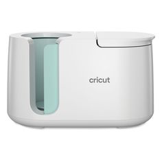 the cricut machine is white and has a light blue handle on it's side