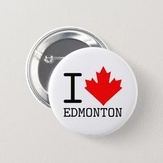 a button with the word edmonton written in black and red, on a white background