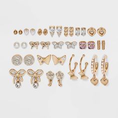 18-piece gold-tone stud and hoop earring set from Wild Fable™ adds glam appeal to your looks. Designs range from simple round stud to faux pearl, butterfly shape and more. Post-back closures help keep the earrings secure. Nickel-free construction suits all types of skin. If you're not satisfied with any Target Owned Brand item, return it within one year with a receipt for an exchange or a refund. Wild Fable™: A look for every story. Fanny Pack Fashion, Hoop Earring Set, Types Of Skin, Heart Butterfly, Target Gifts, Heart Icon, Rose Heart, Rosé Heart, Stylish Glasses