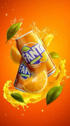 an advertisement for fanta orange juice with splashing oranges and leaves around it